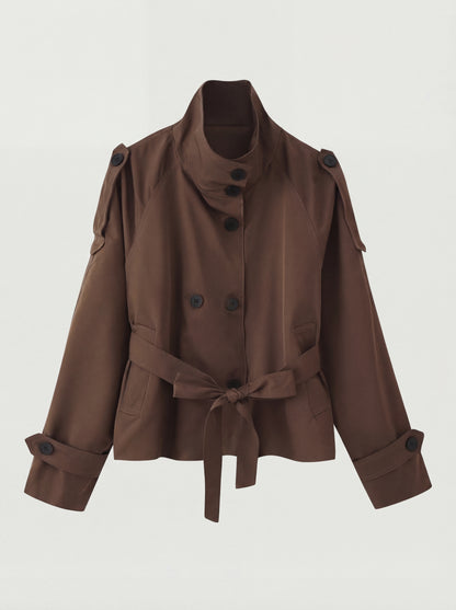 Brown jacket with a belt on a light gray background