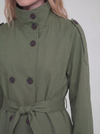 Green coat with buttons on a white background
